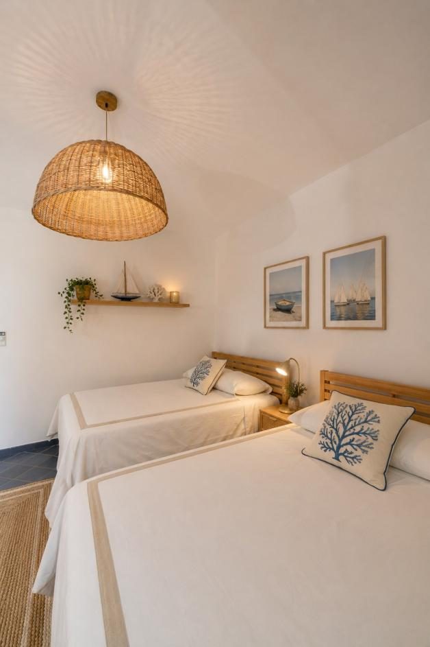 Twin bedroom with rattan lamp