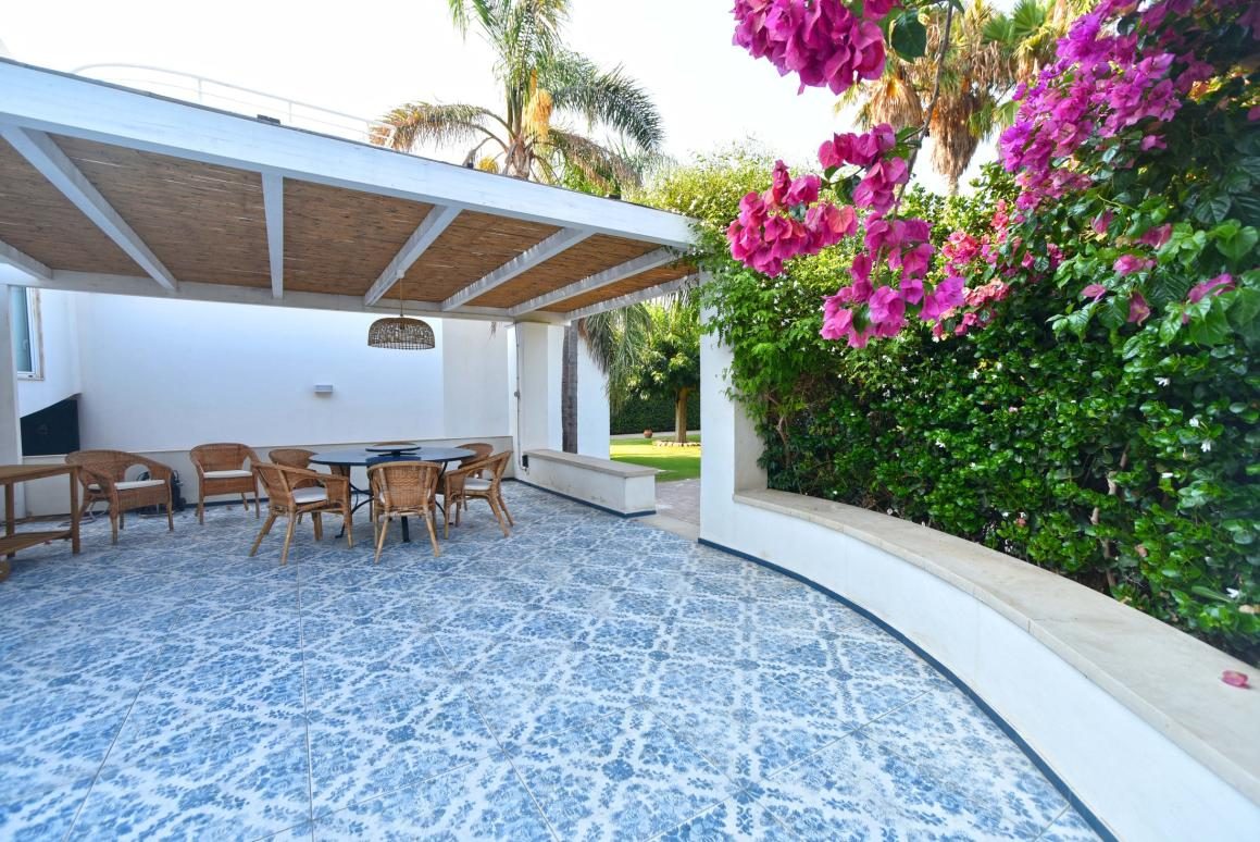 Covered veranda with dining table