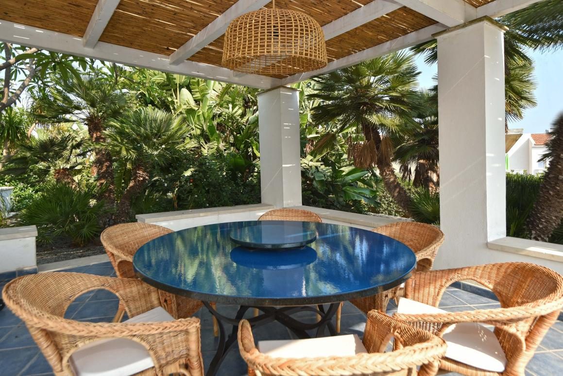 Pergola dining area in the garden